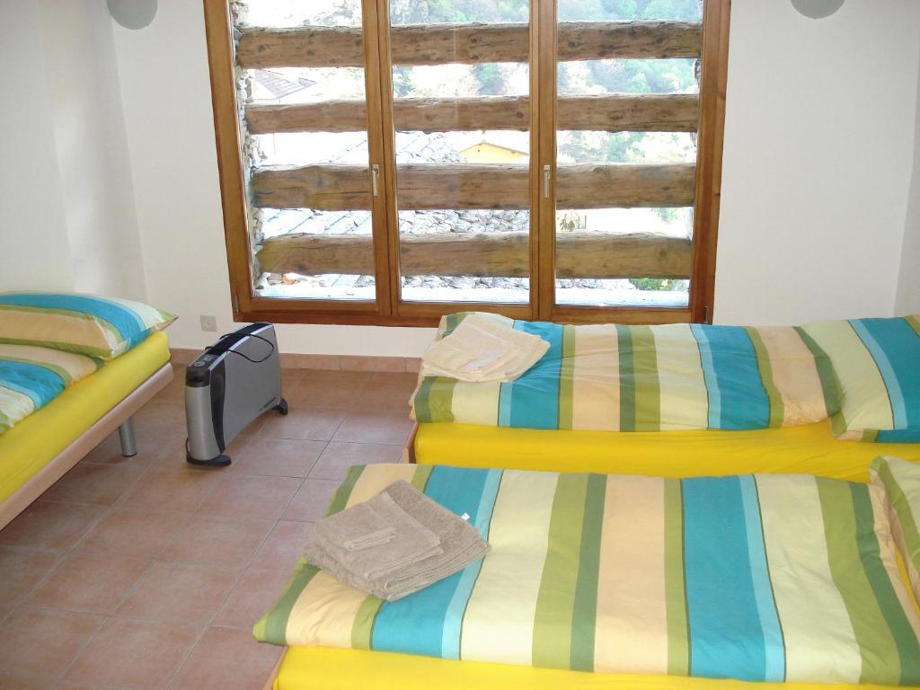 Rustico Pacifico Apartamento Brontallo Quarto foto